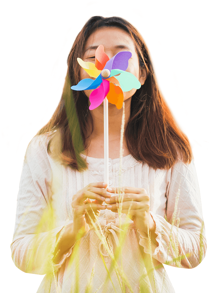 "Silhouette of beautiful girl holding wind toy at meadow" by Chayantorn Tongmorn Shutterstock Silhouette of girl holding wind toy